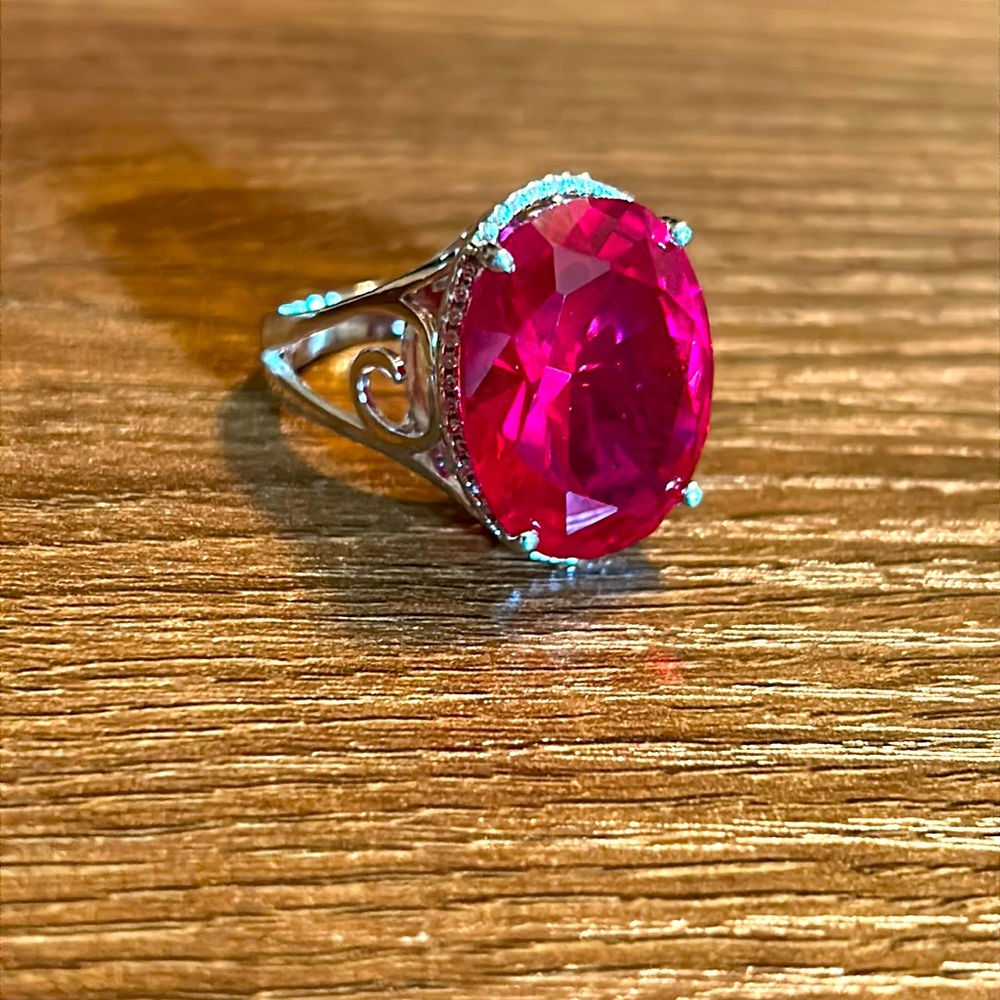 Sterling silver red pink oval gemstone ring with clear gemstones.  Size 9.5